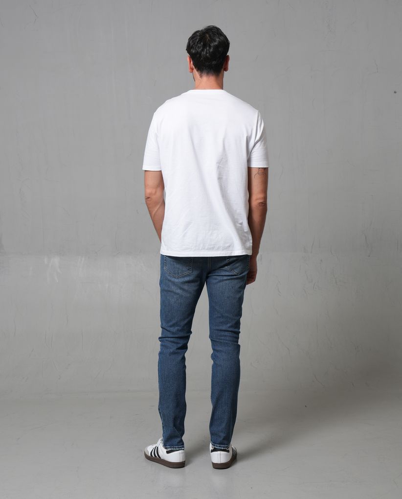 Jean Slim tono medio para hombre