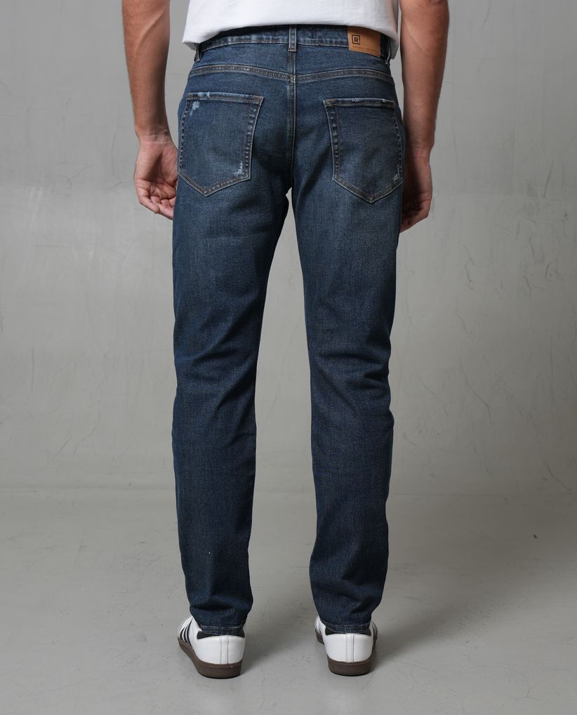 Jean Slim con desgastes localizados para hombre