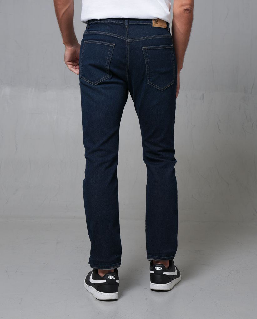 Jean Slim tono oscuro para hombre