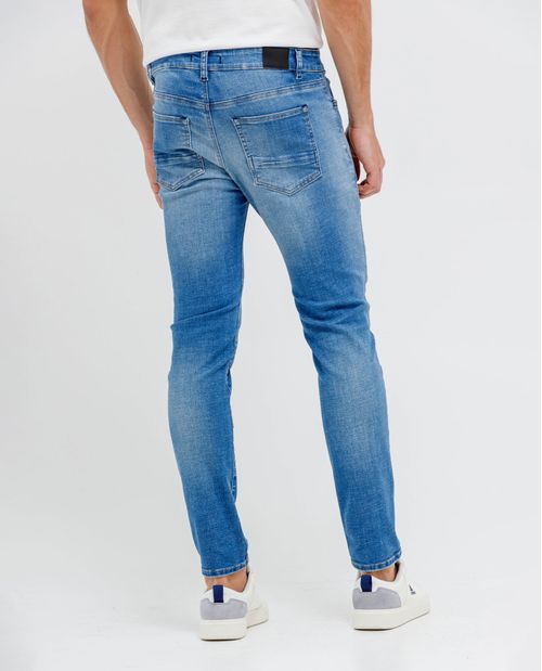 Jean Super Slim con desgastes localizados para hombre