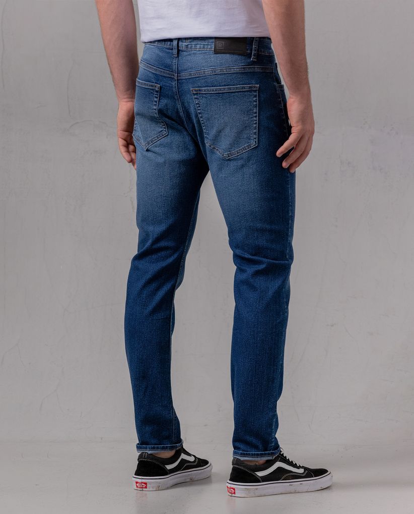 Jean Slim tono medio para hombre