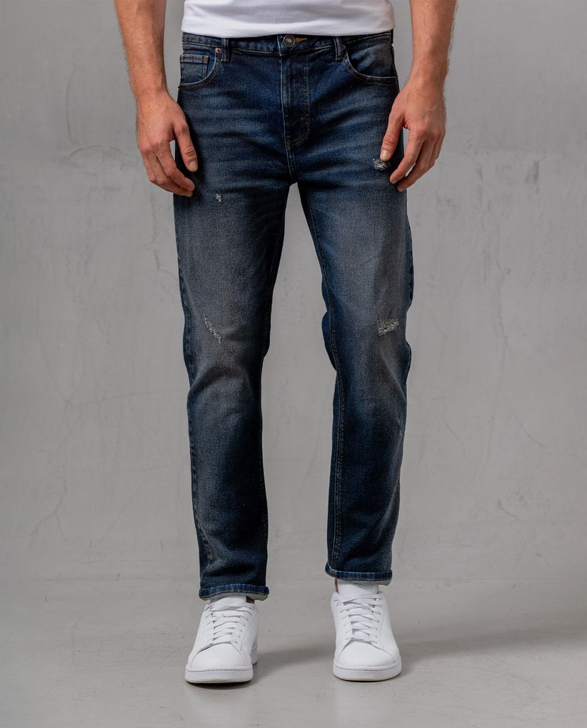 Jean Slim tono oscuro para hombre