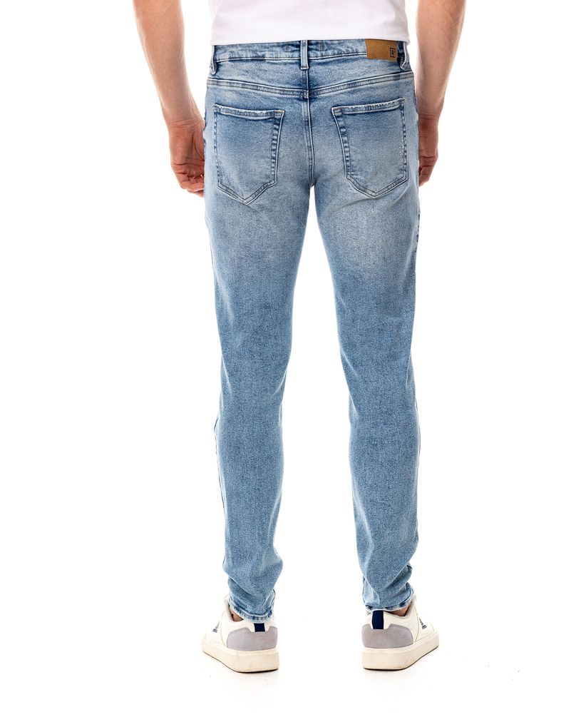 Jean Slim con rotos para hombre