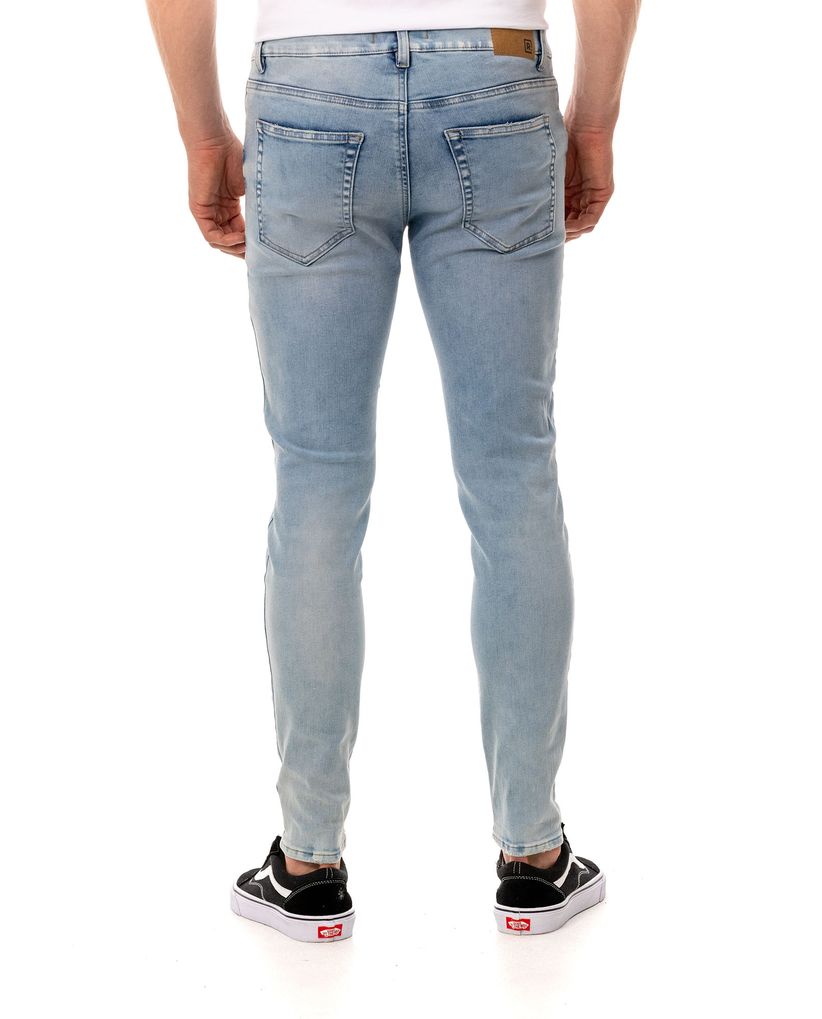 Jean Supe Slim en tono claro para hombre