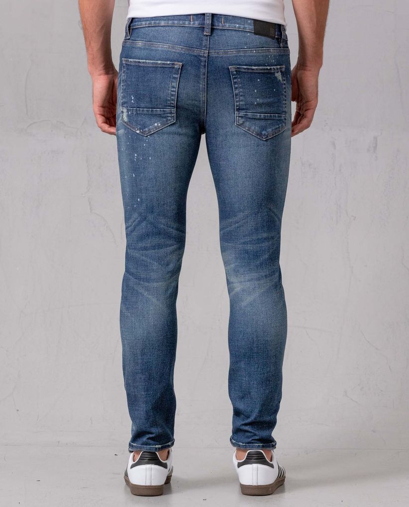 Jean Super Slim con rotos y efecto salpicado para hombre