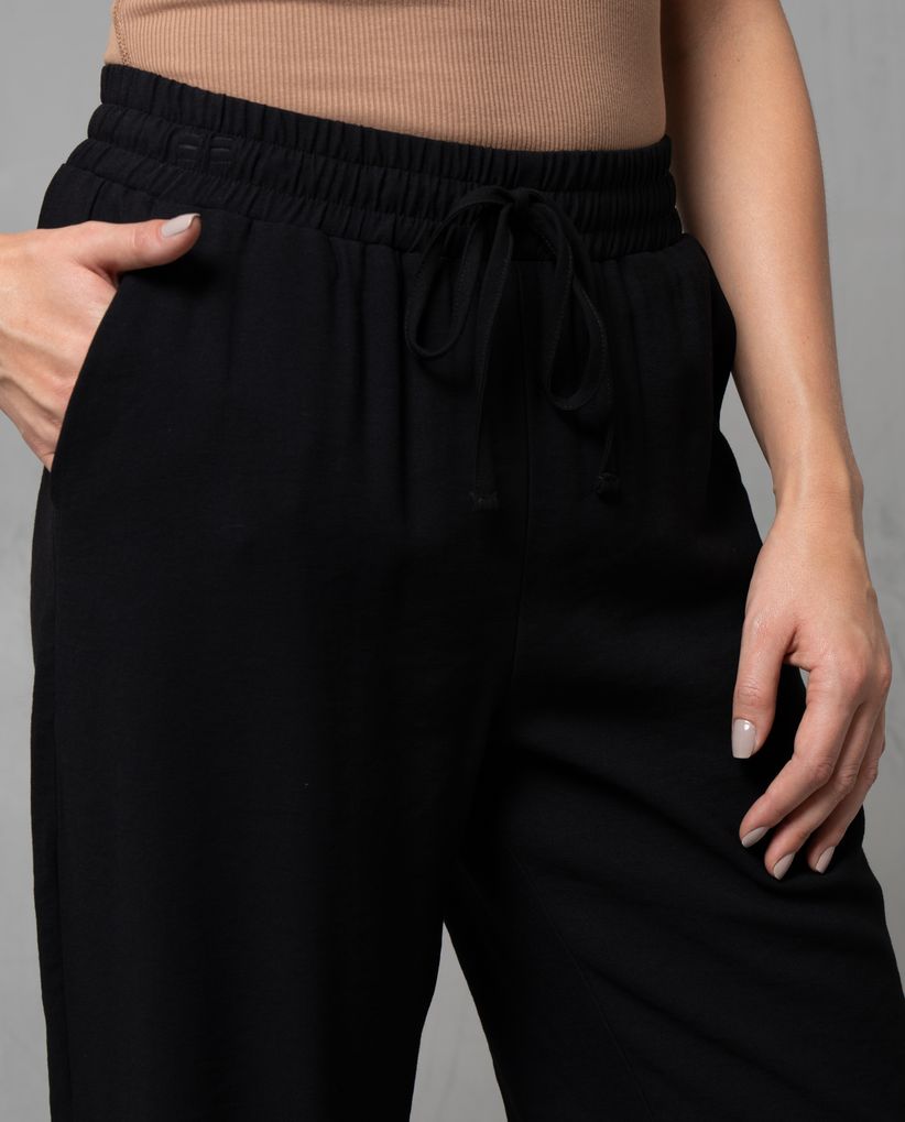 Pantalón con cintura elástica y abertura en bota para mujer