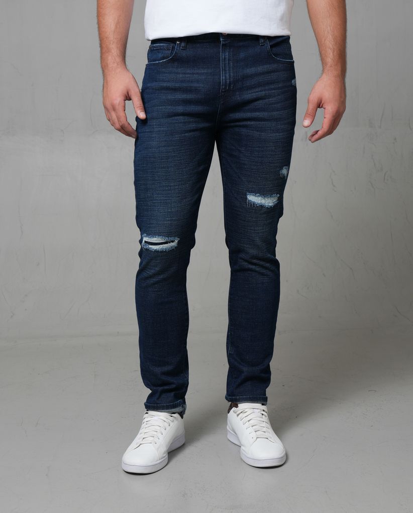 Jean Slim con rotos tono medio para hombre