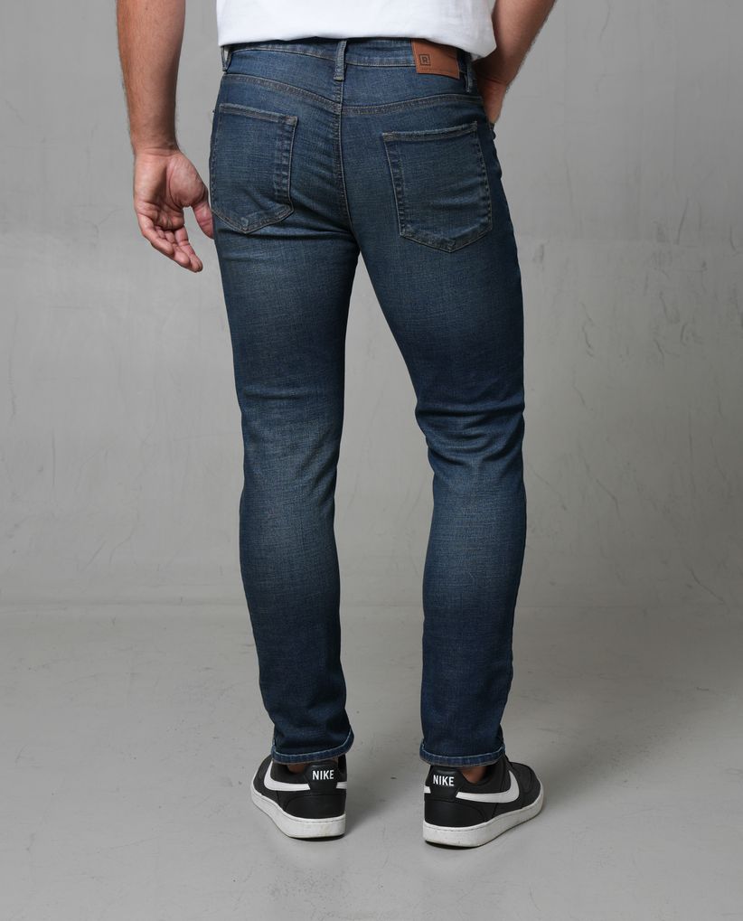 Jean Slim tono oscuro para hombre