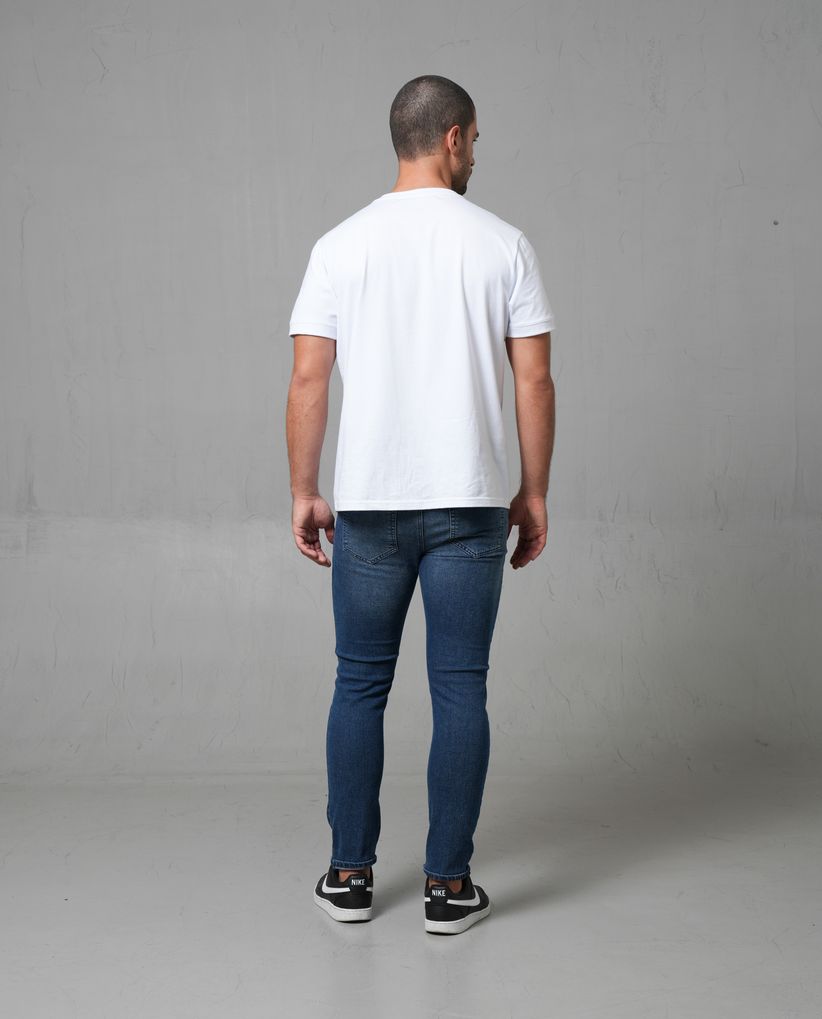 Jean Slim tono oscuro para hombre