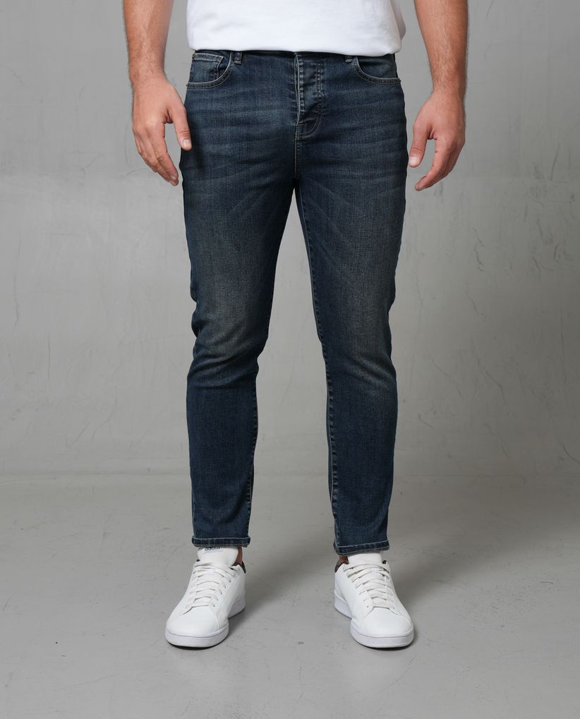 Jean Slim tono oscuro para hombre