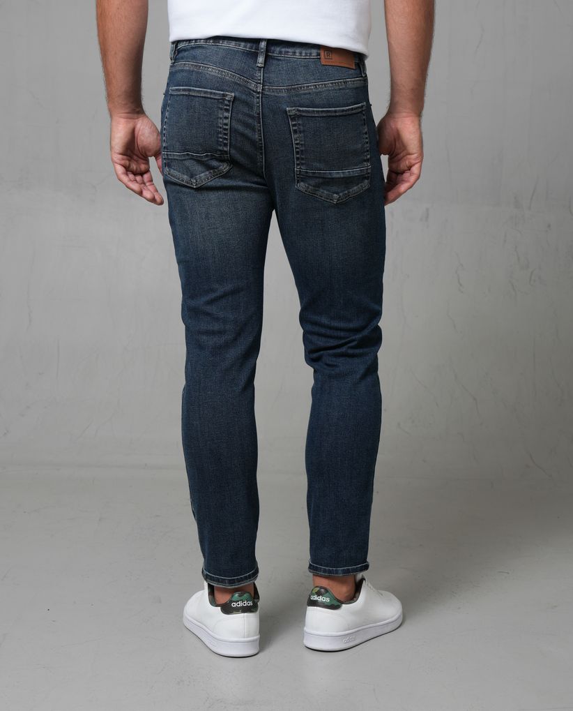 Jean Slim tono oscuro para hombre