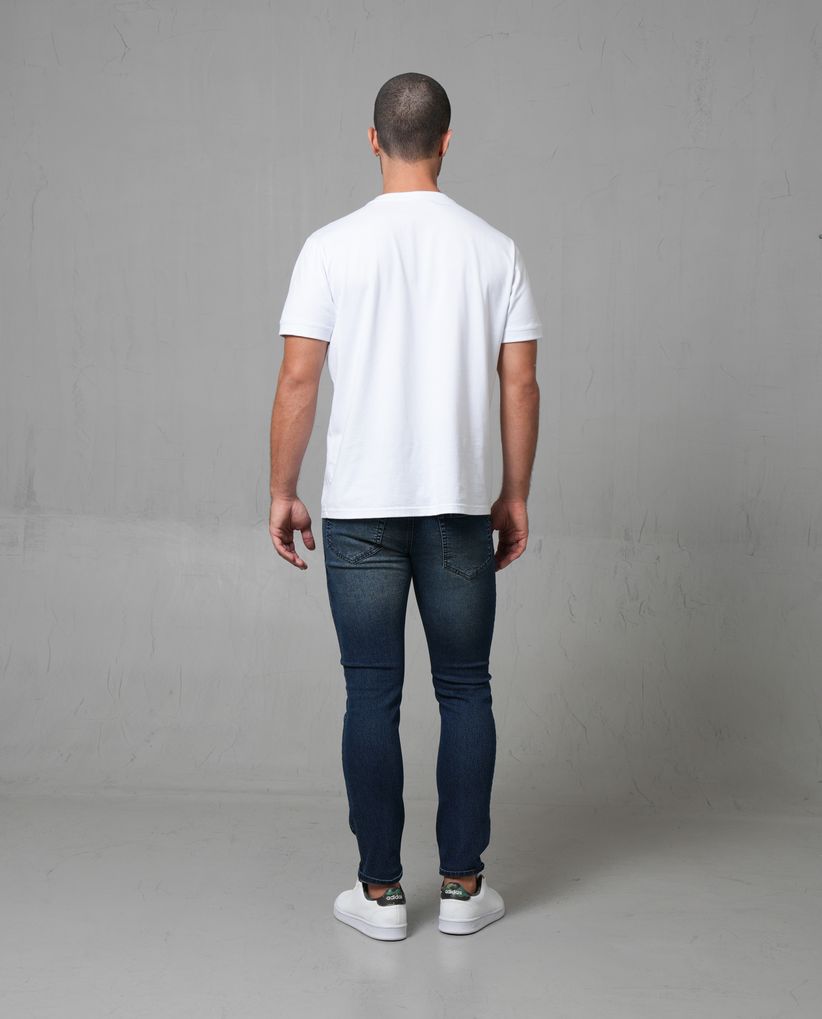 Jean Slim tono medio con iluminaciones para hombre