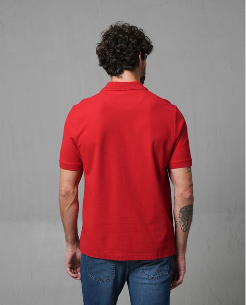 Polo con aplique de puma en punto corazón para hombre
