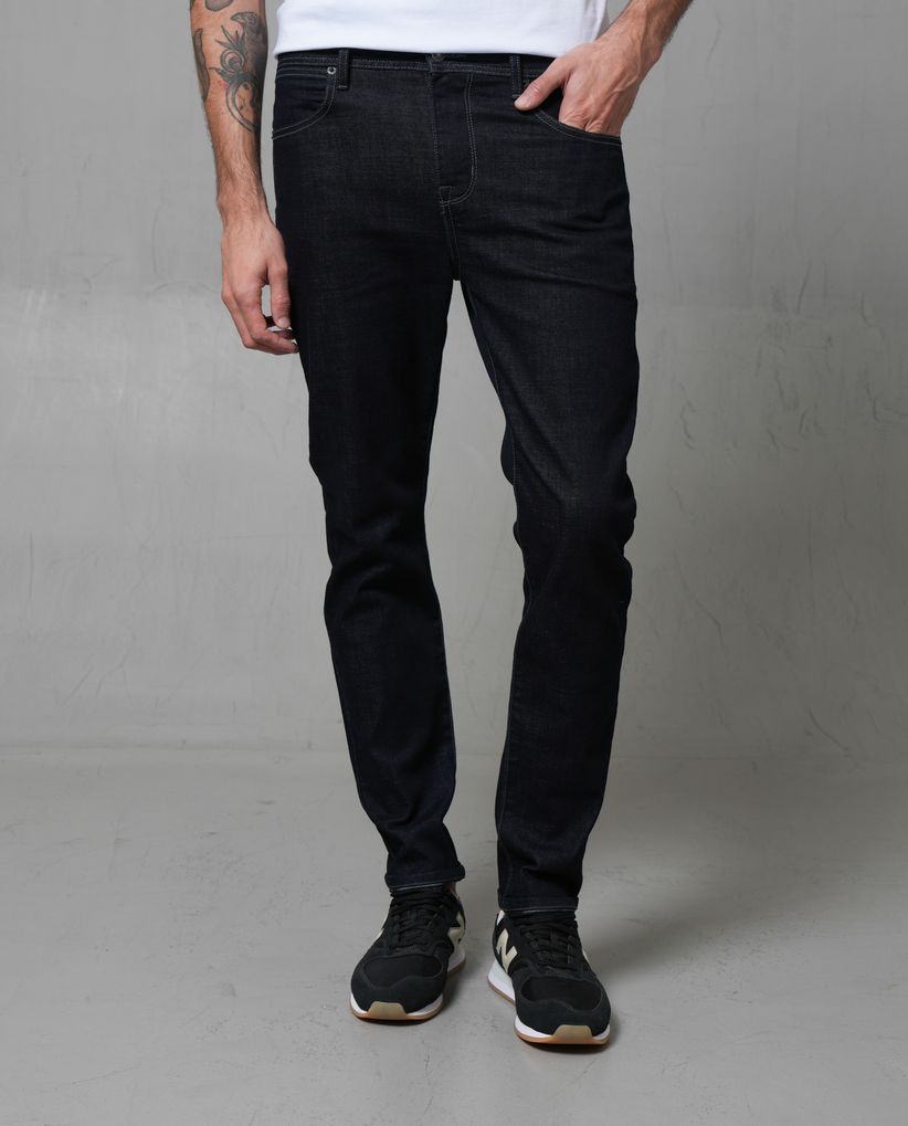 Jean Slim tono oscuro para hombre