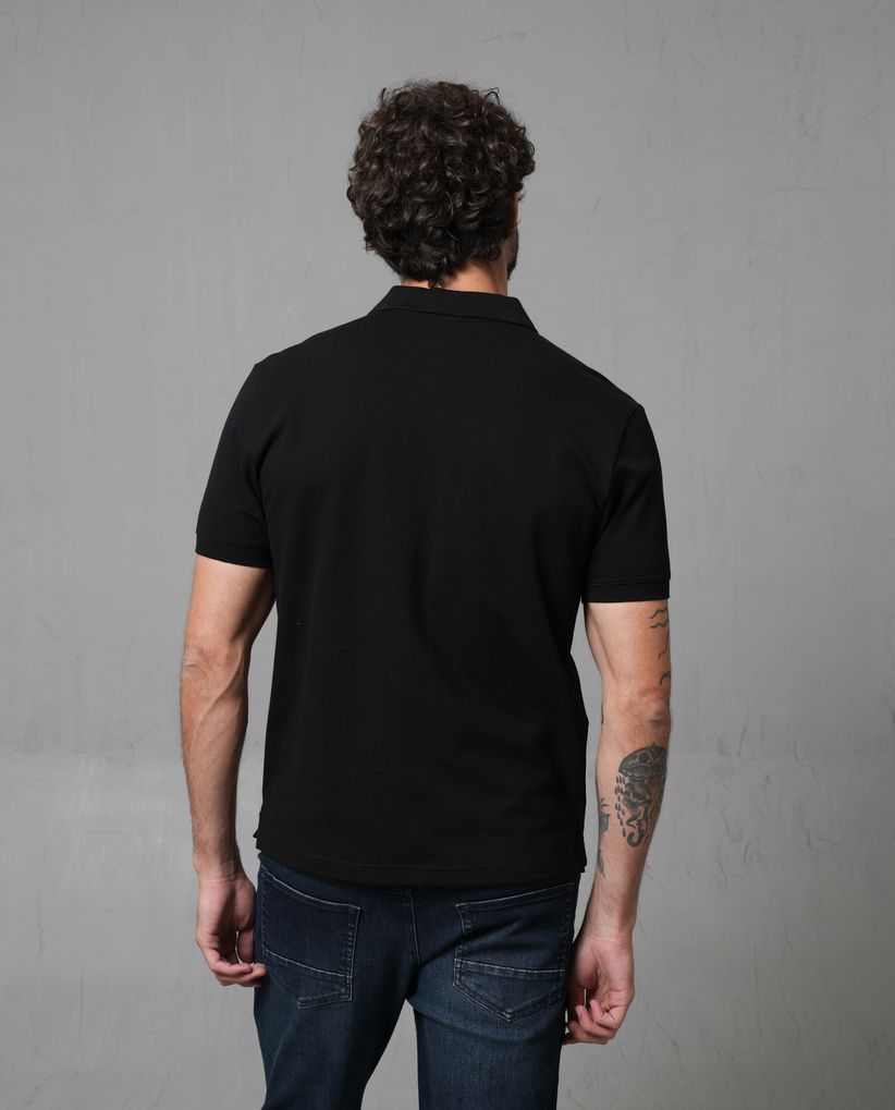 Polo con aplique de puma en punto corazón para hombre