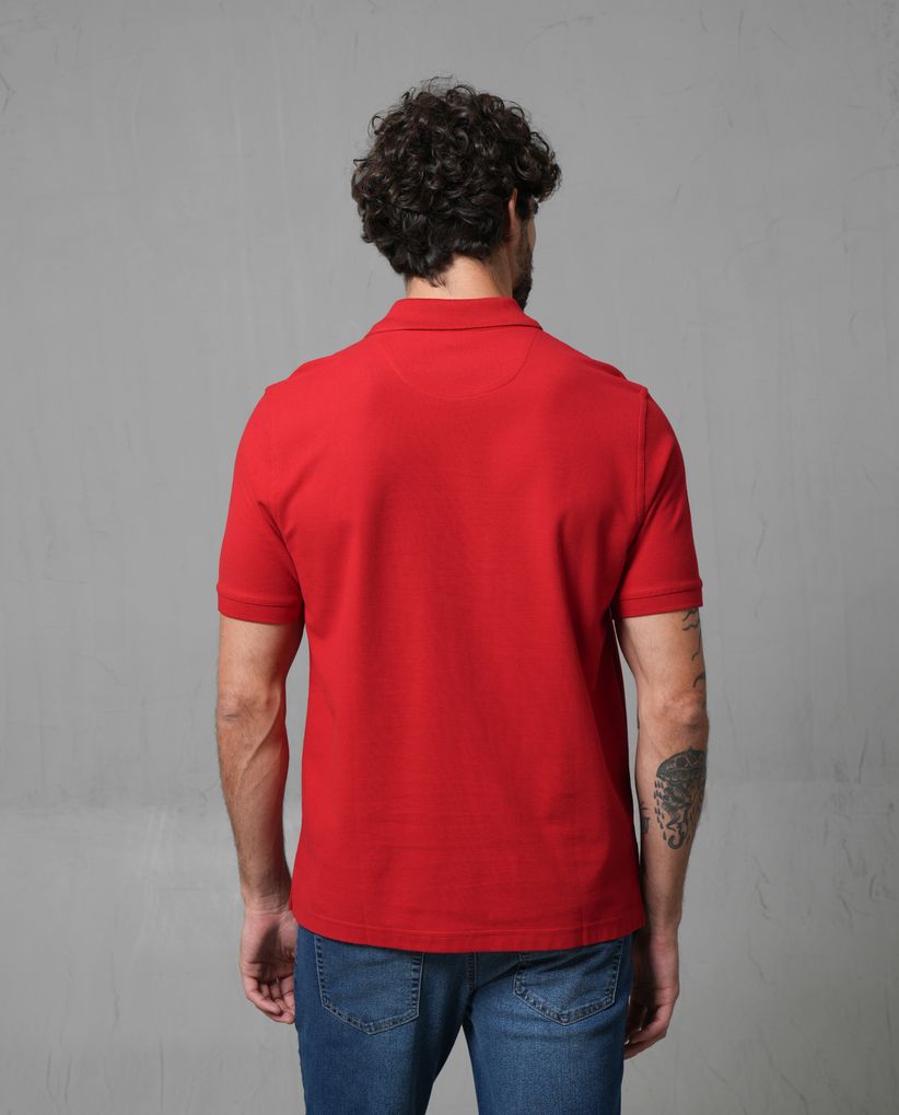 Polo con aplique de puma en punto corazón para hombre